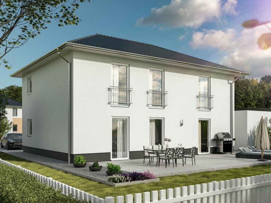 Das Flair 180 Duo in der Variante Trend mit Blick in den Garten des Zweifamilienhauses